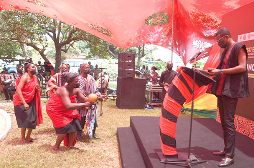 Mr Mark Okraku Mantey( right),  Deputy Minister of Tourism,  Arts and Culture being welcomed with a cultural performance before he delivers his speech