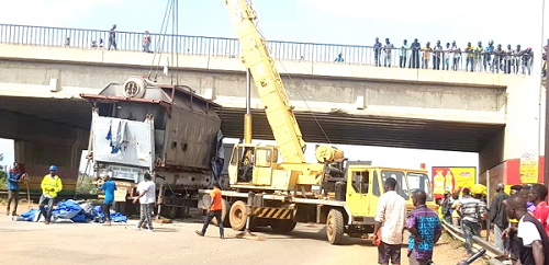 The truck stuck under the overpass