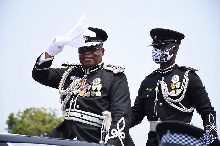 The outgoing Inspector General of Police (IGP), Mr James Oppong-Boanuh (left) with the acting IGP, Dr George Akuffo Dampare