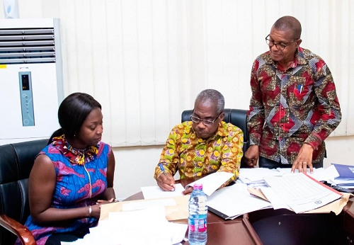  Prof. Frederick Kwaku Sarfo (2nd right), Vice-Chancellor of AAMUSTED, signing the MoU. With him is Dr Abena Asomaning Antwi, Managing Director of AFESC, and Prof. James Kagya-Agyemang, Pro Vice-Chancellor of the university