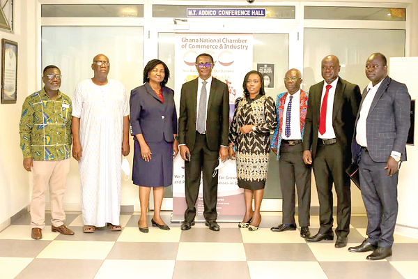 Mr Amishaddai Owusu-Amoah (4th left) with executive of the GNCCI