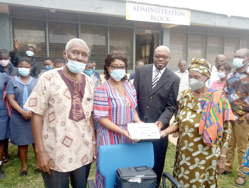 Mr Setumte Ametewee (2nd right), the Headmaster of DemoDeaf, receiving the audiological equipment from representatives of Dorothy's Hope Incorporated led by Professor Nathaniel Kofi Pecku (left), Mrs Augustina Boadu (2nd left) and Mrs Dorothy Abena Ampofoa Pecku (right)