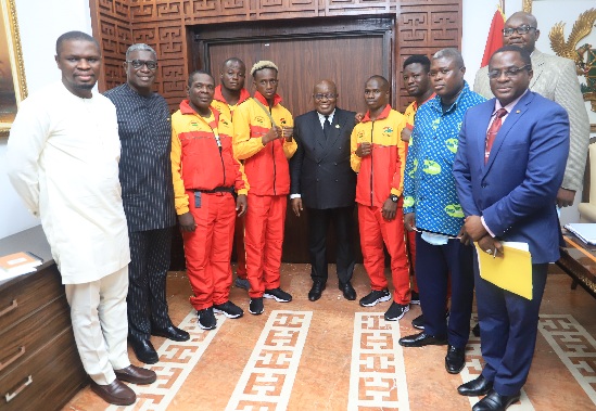 President  Akufo-Addo with Mr Mustapha Ussif (left) Minister of Sports  a delegation from the Team Ghana after a meeting at the Jubilee House