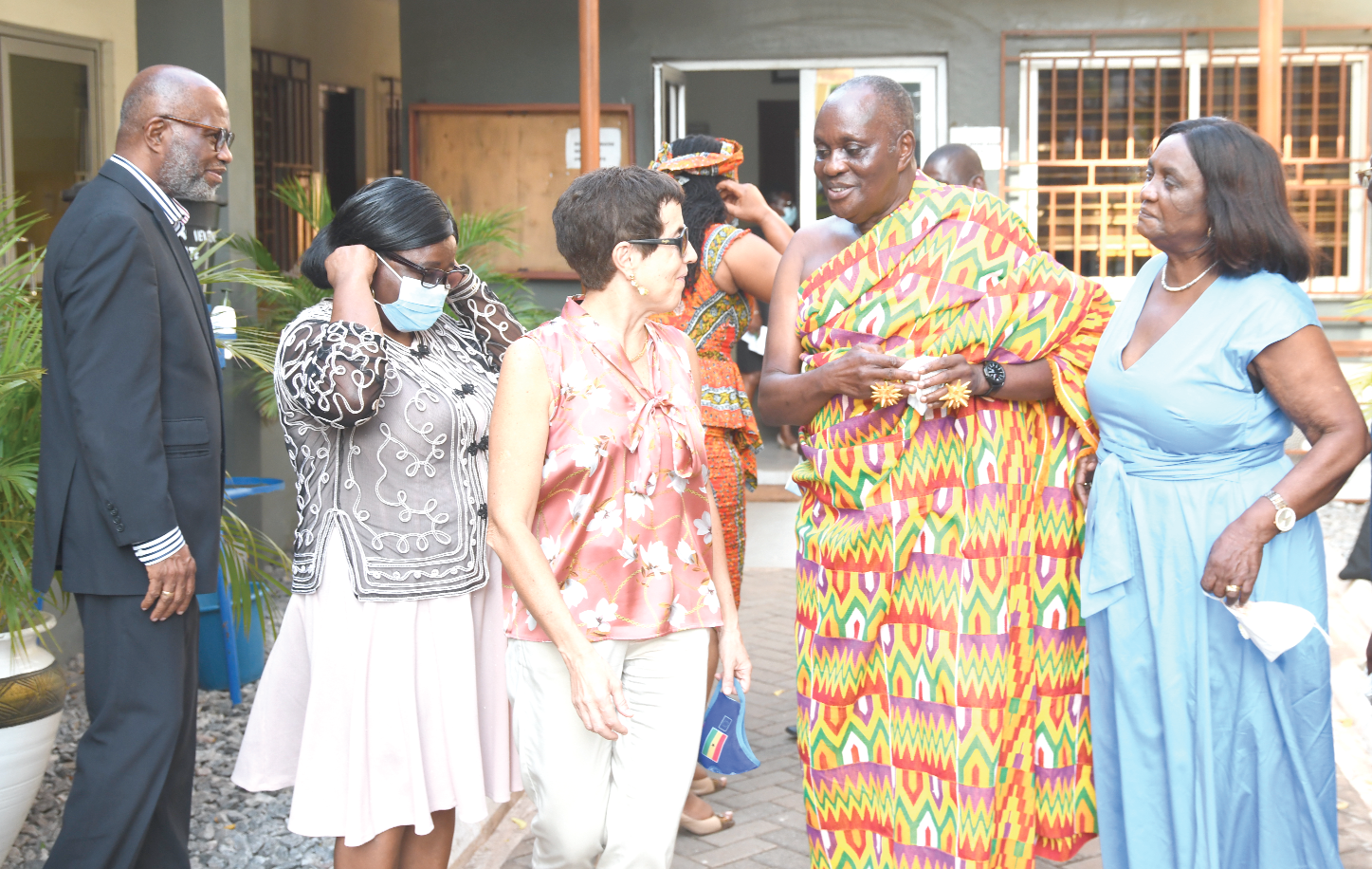 Nana Otuo Siriboe ll (in Kente cloth), Chairman of the Council of State, having a chat with Mrs Diana Acconcia, the Head of the EU Delegation to Ghana, after the meeting. Looking on are some members of the council, including Mrs Justice Georgina Wood (right), a former Chief Justice. Picture: EBOW HANSON  