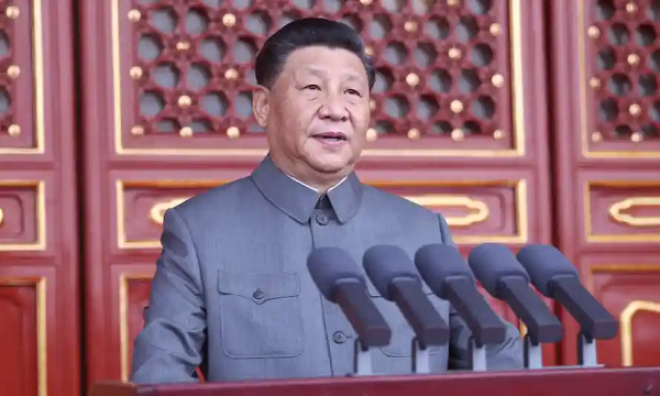 Xi Jinping delivers a speech at a ceremony marking the centenary of the CCP in Beijing. Photograph: Xinhua/REX/Shutterstock