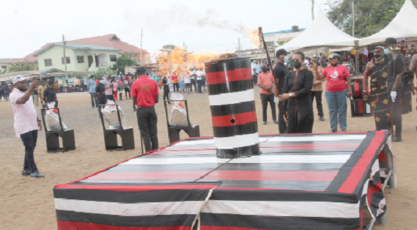  Dr Zanetor Agyeman Rawlings,  Member of Parliament for Klottey Korle, lighting the perpetual flame at the  ceremony.  Picture: ESTHER ADJEI