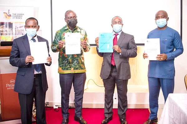 From left: Mr Collins Anim-Sackey, Director of Policy, Planning and Minerals Titles at the Minerals Commission; Prof Alex Dodoo, Director-General, Ghana Standards Authority; Mr Sulemanu Koney, Chief Executive Officer, Ghana Chamber of Mines, and Mr Theophilus Otchere, Chairman of the Supply Managers’ Committee – Ghana Chamber of Mines display the MOUs at an event in Accra