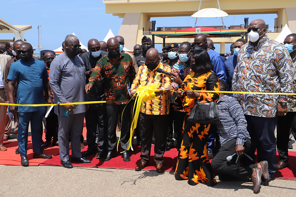  President Akufo-Addo (3rd left) cutting the tape to commission the sanitation trucks in Accra. With him are Mrs Cecilia Abena Dapaah (2nd right), Sanitation Minister; Mr Henry Quartey (right), Greater Accra Regional Minister, and Mr Joseph Siaw Agyepong (arrowed), Chairman, Jospong Group.  ABOVE: Some of the trucks. Picture: SAMUEL TEI ADANO