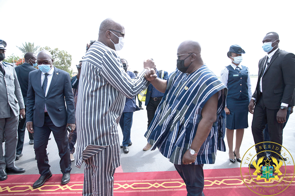 President Akufo-Addo (right) being welcomed to Burkina Faso by President Roch Marc Christian Kabore