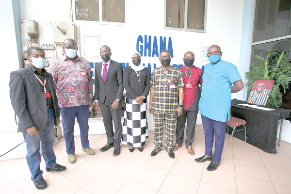 • The Daily Graphic Editorial Team, led by Mr Kobby Asmah (3rd right), the Editor, with Mr Affail Monney (3rd left), and Ms Halima El-Alawa, daughter of the late Razak El-Alawa, after they had signed the book of condolence at the Press Centre in Accra