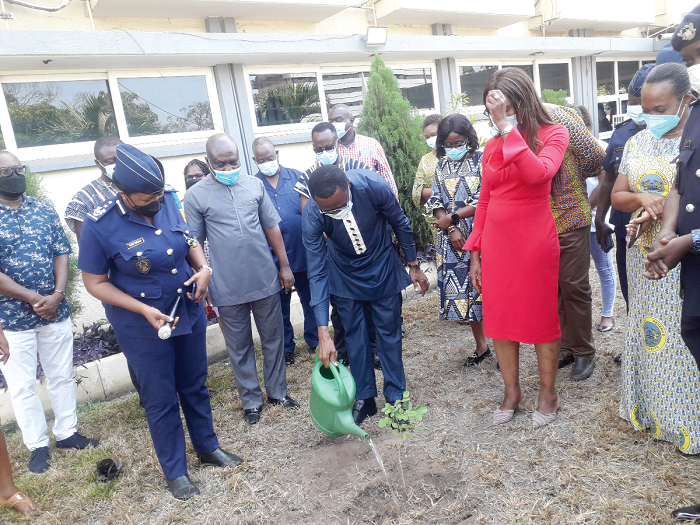  Mr Ammishaddai Owusu-Amoah planting a tree at the GRA head office in support of the Green Ghana Project