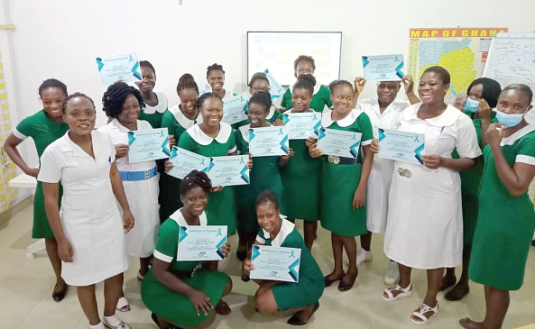 • The trainees with their certificates join the resource persons at the end of the training