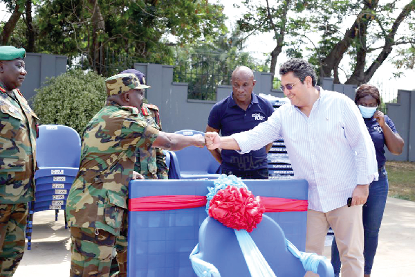 Mr Nadim Ghanem Pares, Deputy Managing Director, Miniplast Limited, handing over the items to Major Gen. Peter Nicholas Andoh, Chief of Staff, Ghana Armed Forces. Picture: NII MARTEY M. BOTCHWAY