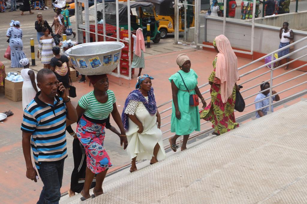 Some shoppers climbing the staircase leading to the new Kejetia market without face masks. Picture: EMMANUEL BAAH