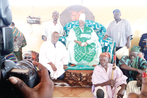Dr Ibrahim Mohammed Awal (seated left), Minister of Tourism, Arts and Culture, after the meeting with Ya-Na, Abukari II, the Overlord of Dagbon, at the Gbewaa Palace in Yendi