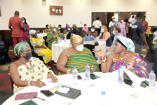 • Some queen mothers interacting at the training.  