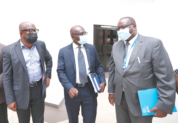 Prof. Felix Ankomah Asante (middle), Pro-Vice-Chancellor, University of Ghana (UG), interacting with Dr Francis Chisaka Kaslo (right), WHO Country representative, as Prof. Samuel Agyei-Mensah of the Department of Geography, UG, looks on. Picture: NII MARTEY M. BOTCHWAY