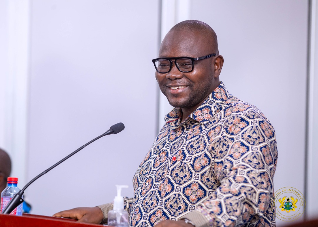 Mr Francis Asenso-Boakye (left),   the Minister of Works and Housing, speaking at the press briefing in Accra