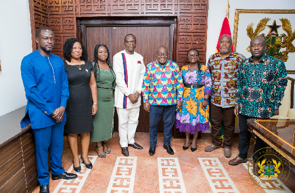 President Akufo-Addo with Mr Affail Monney (4th left), outgoing GJA President, executive members and former award winners and some government officials