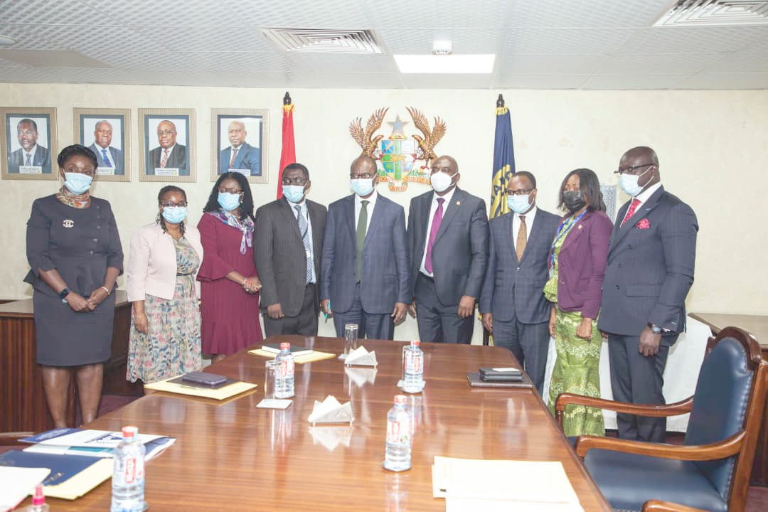 Dr Ernest Addison (5th left) Governor, BoG, with management members of the bank and the Institute of Directors (Gh) during the courtesy call