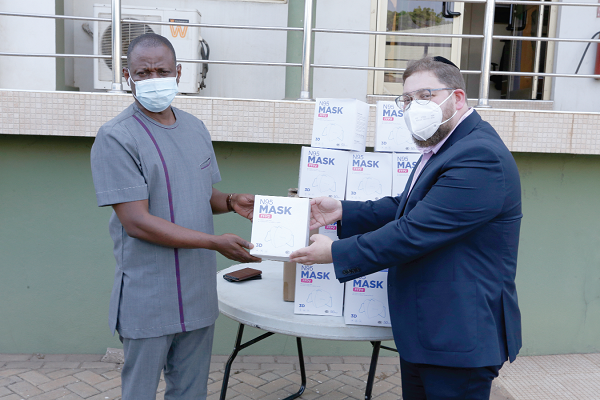 Mr Ari Rothbard (right), Regional Director, Farla Medical International, handing over the items to Dr Patrick Kuma-Aboagye, Director General, Ghana Health Service. Picture: NII MARTEY M. BOTCHWAY