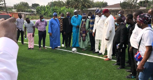 Sheikh Osman Nuhu Sharubutu, National Chief Imam, performing the ceremonial kick-off at the commissioning of the turf