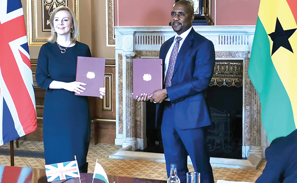 Ms Liz Truss (left), UK Secretary of State for International Trade, and Mr Peprah Ampratwum, Ghana’s acting High Commissioner to the UK, displaying copies of the agreement