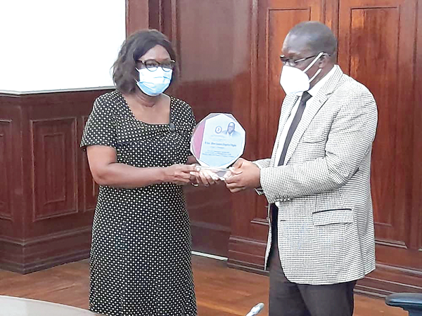 Mrs Sheila Allotey (left), the President of the Women’s Wing of the GAMLS, presenting a citation to Mr Bagbin, the Speaker, during a courtesy call