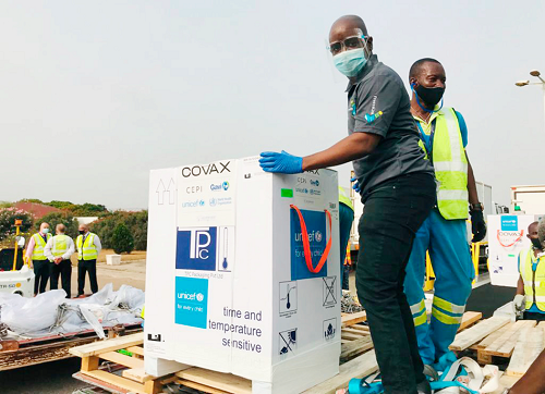 Mr Owusu Akoto, Freezelink CEO with the vaccines at the Kotoka International Airport