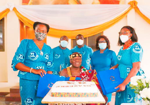 Members of the Zoomlion team with Dasebre Prof. Oti Boateng (seated)