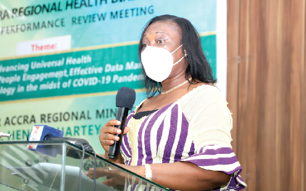  Dr Charity Sarpong, Greater Accra Regional Director of Health Services (inset), addressing the workshop in Accra.  Picture: Gabriel Ahiabor