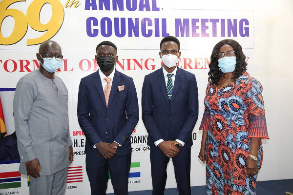  Prof. Kwasi Opoku-Amankwa (left), Director-General of GES, and Mrs Wendy E. Addy-Lamptey (right), Head of the National Office of WAEC, with  Mr Godfred Aseda Obeng (2nd left), the 2nd prize winner, and Mr Cecil Tetteh Kumah (2nd right), 1st prize winner of the award. Picture: ESTHER ADJEI