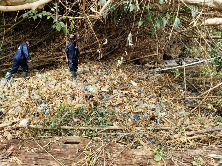 The newly inaugurated River Guards removing some debris from the river