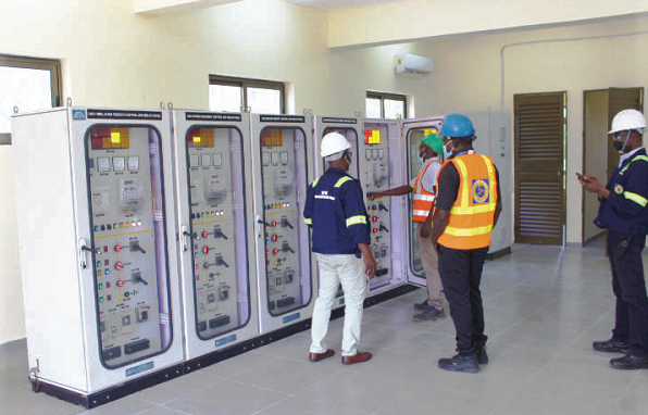  Officers of ECG in the control room after successful installation of the facility