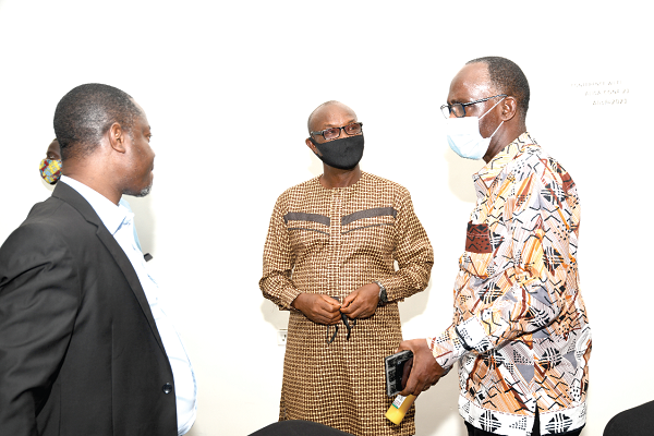 Mr Daniel Nuer (right) explaining a point to some participants. They are Mr Mohammed Amara Salisu (middle), the Deputy Director of Revenue and Tax Policy Division of the Ministry of Finance, Sierra Leone, and Mr Ahmed Owes (left), Tax Adviser of Tullow Ghana Limited. Picture: EBOW HANSON