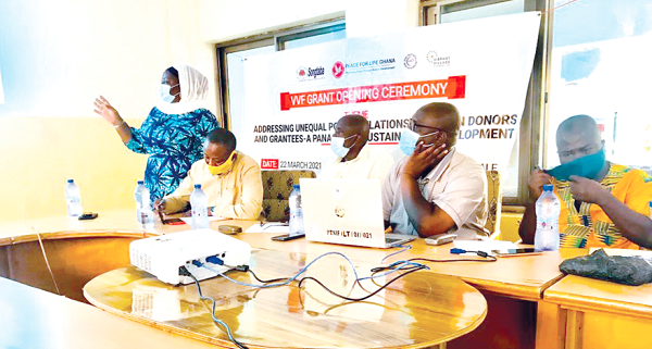 Hajia Lamnatu Adam (standing), Executive Director of Songtaba, a non-governmental organisation and one of the stakeholders, making a presentation on her organisation’s activities at the dialogue