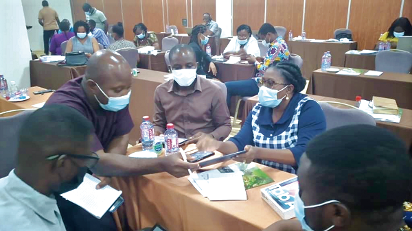 Participants trying their hands on the digital platform