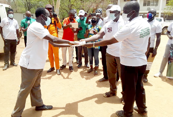 •The three organisations presented a four-point petition to Mr Francis Ennor (left), the Upper East Regional Director of the Department of Food and Agriculture