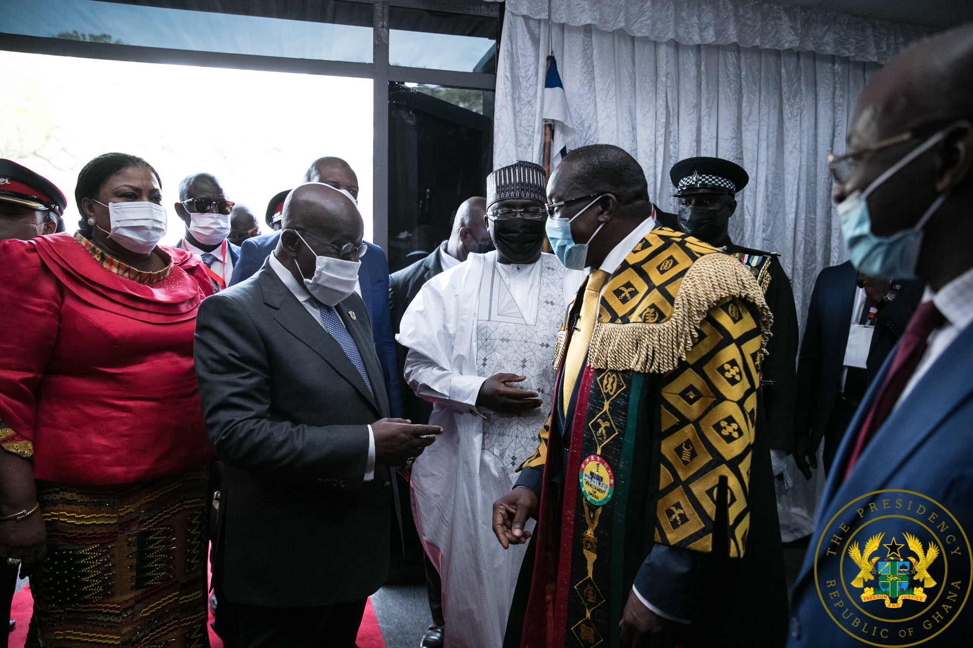 President Akufo-Addo (left) interacting with Mr. Alban Sumana Bagbin (right) at the SONA 2021 in Accra. Those with them include Mr. Osei Kyei-Mensah-Bonsu (2nd right), the Majority Leader, and Mr. Haruna Iddrissu (3rd right), the Minority Leader