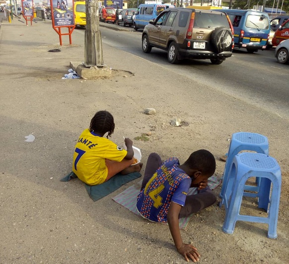 These children are taking a rest after roaming on the streets to beg for alms