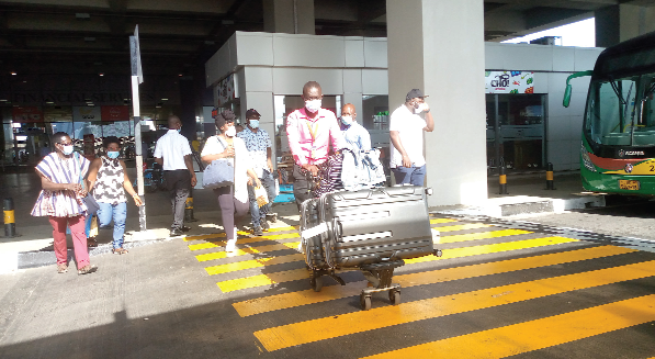 Some passengers wearing face masks upon arrival at the Terminal 3 of the Kotoka International Airport in Accra after the Daily Graphic publication on Tuesday. Pictures: Samuel Tei Adano &amp; Benedict Obuobi