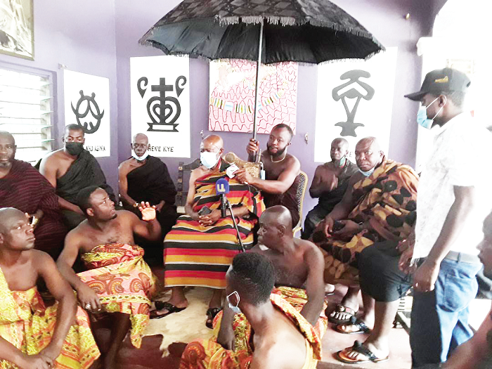 Nana Agyen Frimpong Ababio (arrowed) addressing the media at his palace
