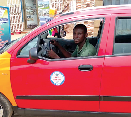 Mr Frank Ohene Djan in his vehicle
