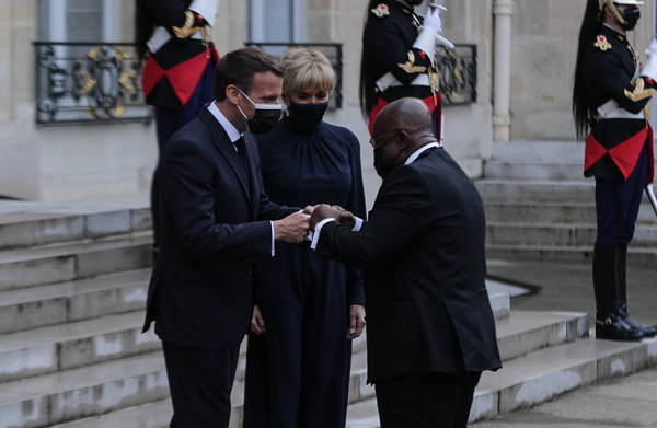 President Akufo-Addo (right) being welcomed by the French President, Emmanuel Macron, to the Elysee Palace in Paris