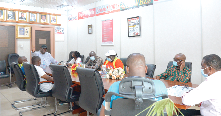 Mr Henry Quartey (hands stretched), Greater Accra Regional Minister, addressing the meeting. With him are some staff of the Greater Accra Regional Coordinating Council. Picture: ALBERTA MORTTY