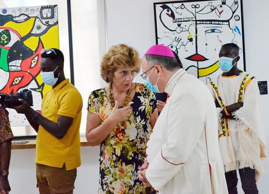 Ms Claudia Turbay, Colombiam Ambassador to Ghana, sharing a point with the Apostolic Nuncio of Ghana, Monsignor Henryk Jagodziński 