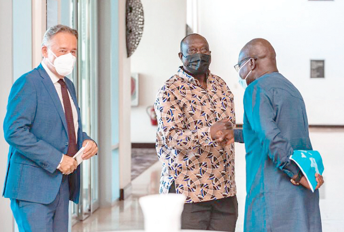 Prof. Alex Dodoo (right), Director-General of GSA exchanging pleasantries with Mr Alan Kyerematen, Minister of Trade and Industry, while Mr Christoph Retzlaff, the German Ambassador to Ghana, looks on