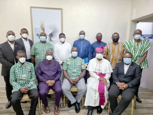 The Most Rev. Charles Gabriel Palmer-Buckle (seated 2nd right), the Archbishop of Cape Coast and Patron of the college; Mr Hackman Owusu-Agyeman (seated 2nd left), Dr Ernest Anthony Osei (seated middle), Chairman; Mr Kobby Asmah (standing 2nd right), Editor, Daily Graphic, also an old student, and some members of the board of trustees and some old students