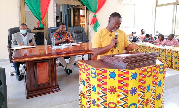 Mr Isaac Appaw-Gyasi, the MCE for New Juaben South, addressing assembly members in Koforidua