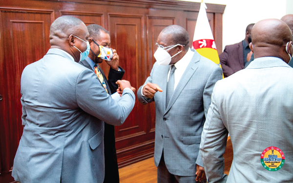 Mr Bagbin (3rd left), Speaker of Parliament, exchanging pleasantries with Nana Osei Bonsu (middle), President of PEF